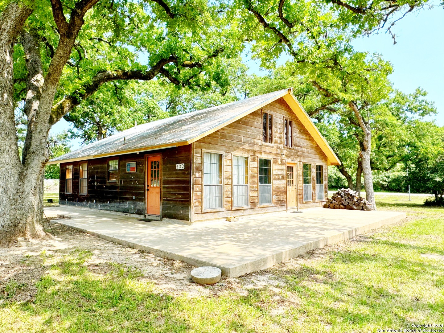 102 Mclendon Somerville, TX 77879 - Photo 1 of 1 a front view of a house with a yard