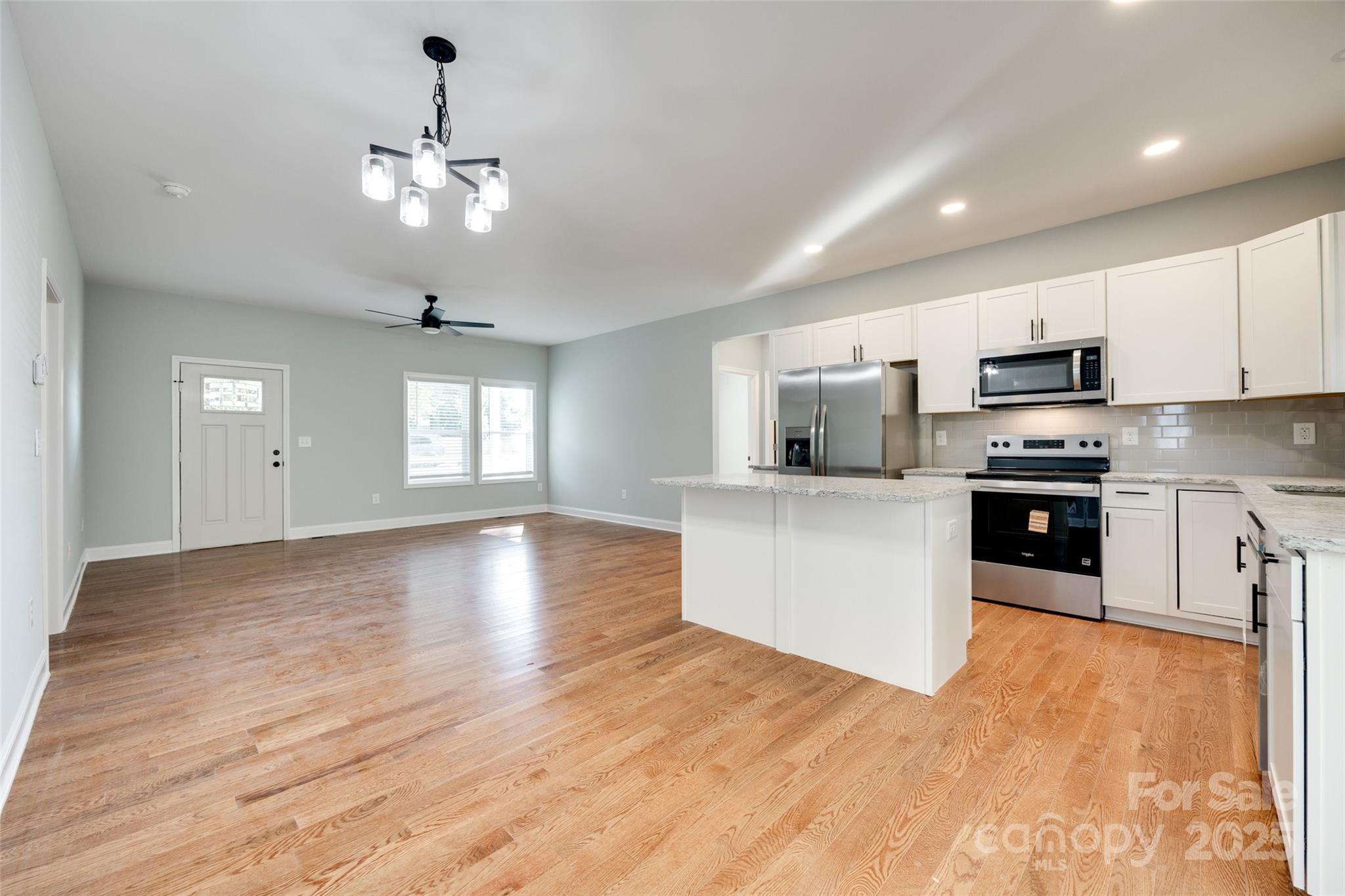 171 William Street York, SC 29745 - Photo 13 of 28 a view of kitchen with microwave and cabinets