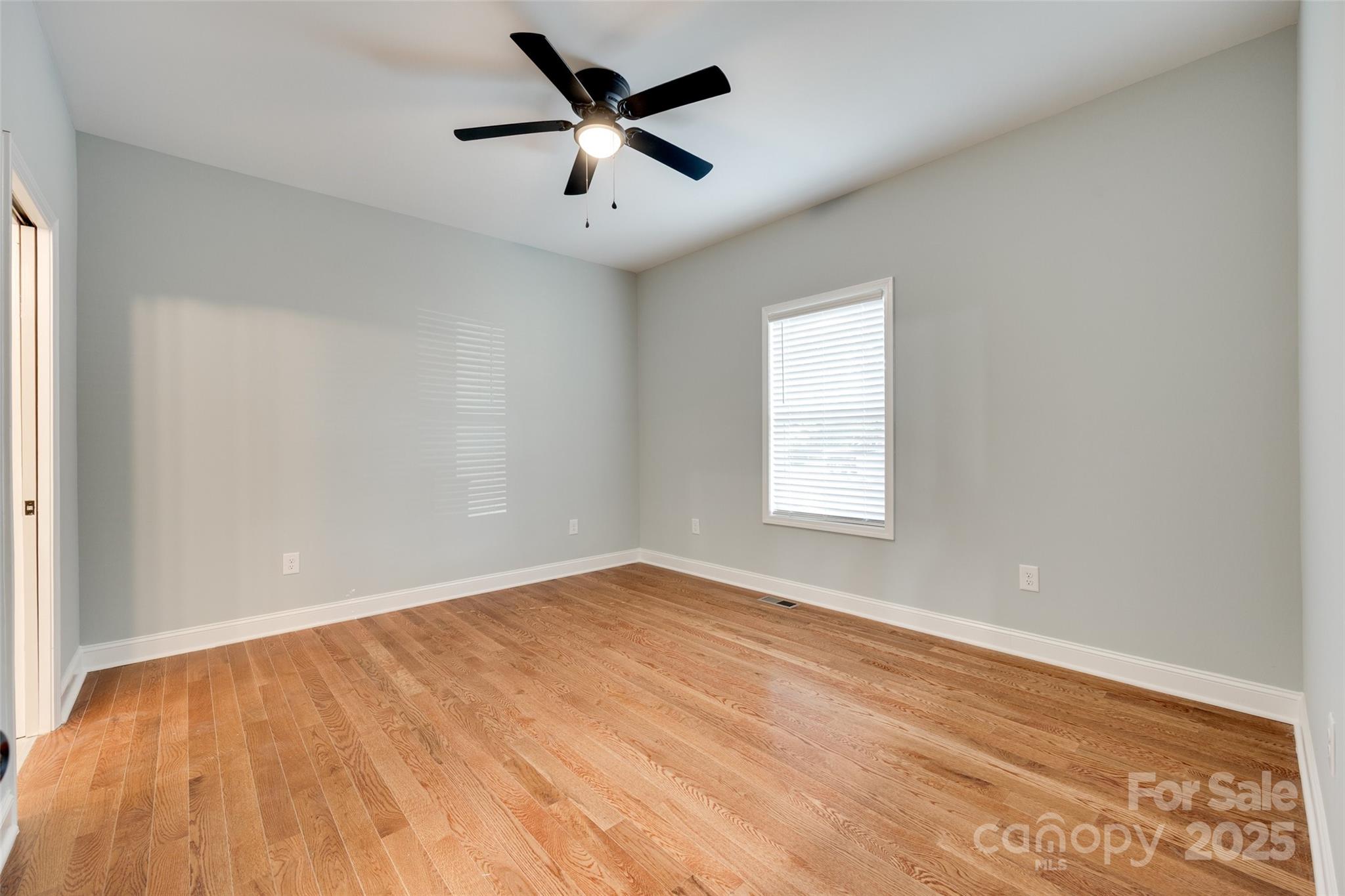 171 William Street York, SC 29745 - Photo 18 of 28 an empty room with wooden floor and windows