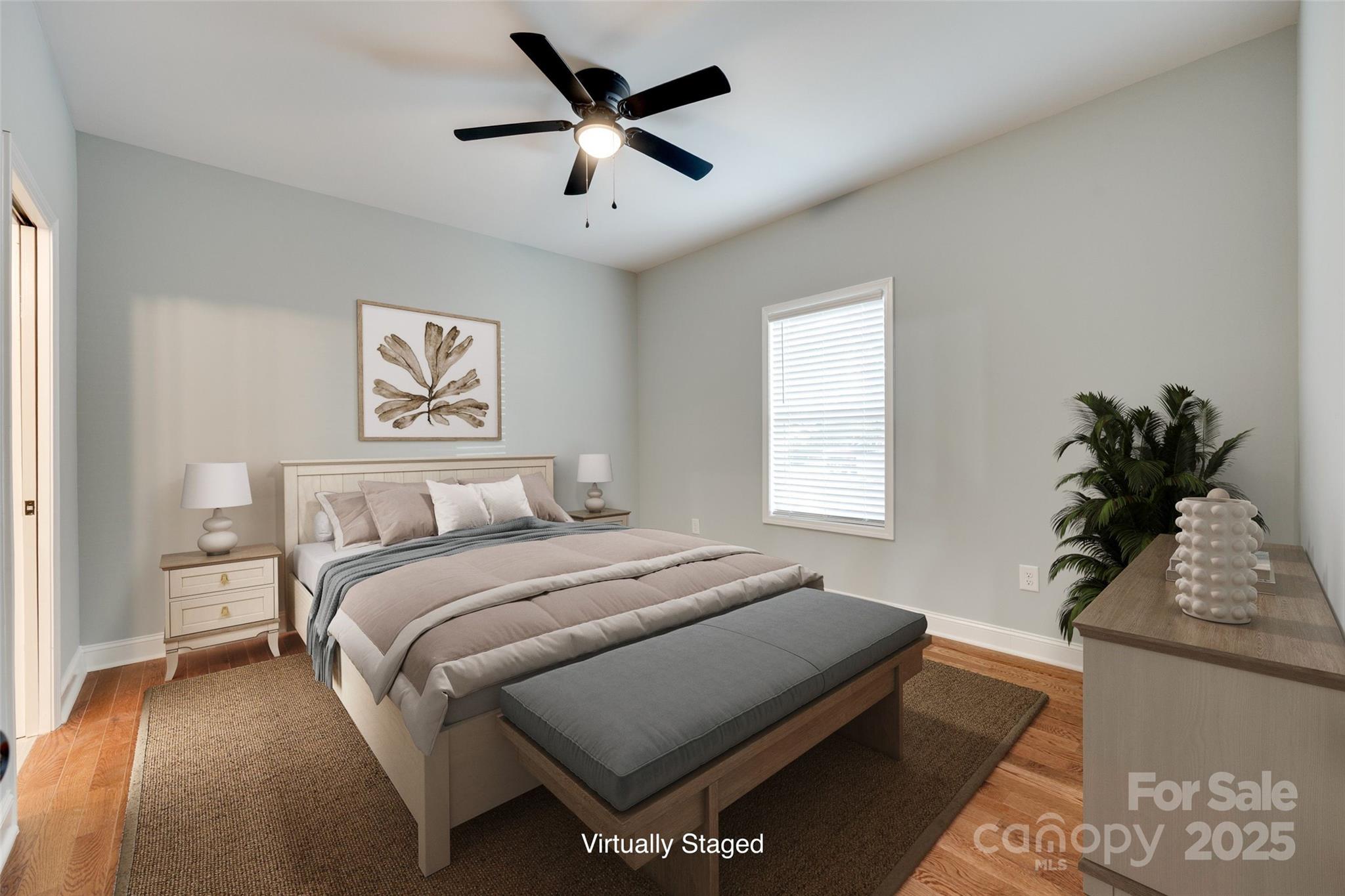 171 William Street York, SC 29745 - Photo 19 of 28 a bedroom with a large bed and a chandelier