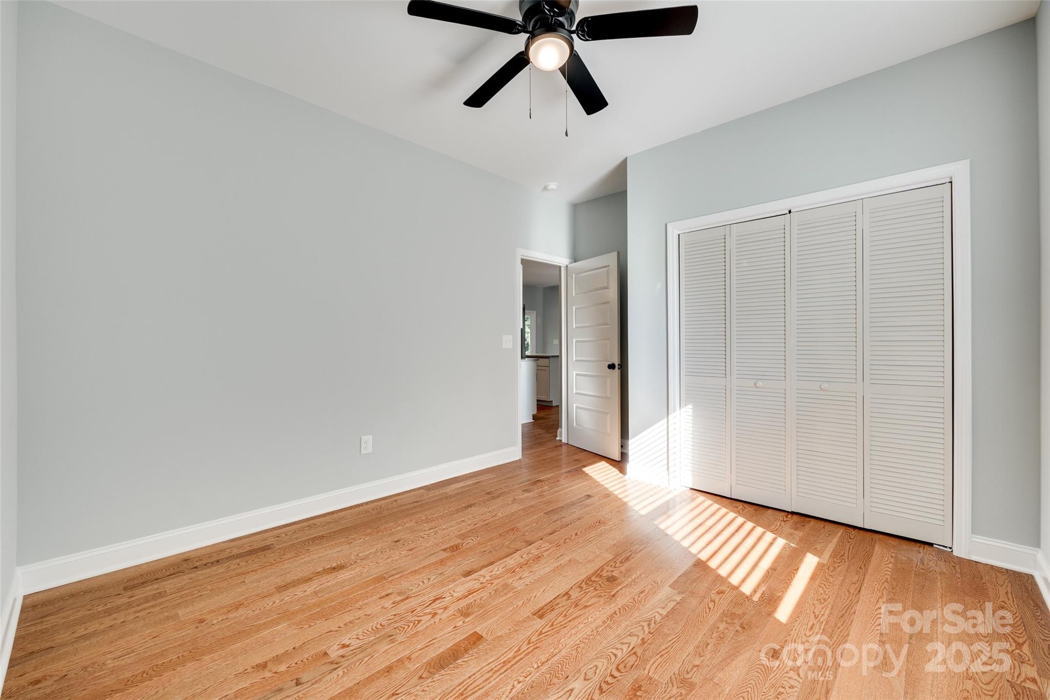 171 William Street York, SC 29745 - Photo 26 of 28 a view of empty room with wooden floor and ceiling fan