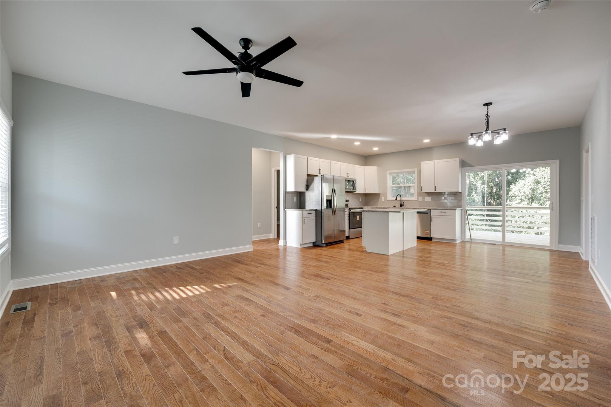 171 William Street York, SC 29745 - Photo 4 of 28 a view of a kitchen with a sink and wooden floor