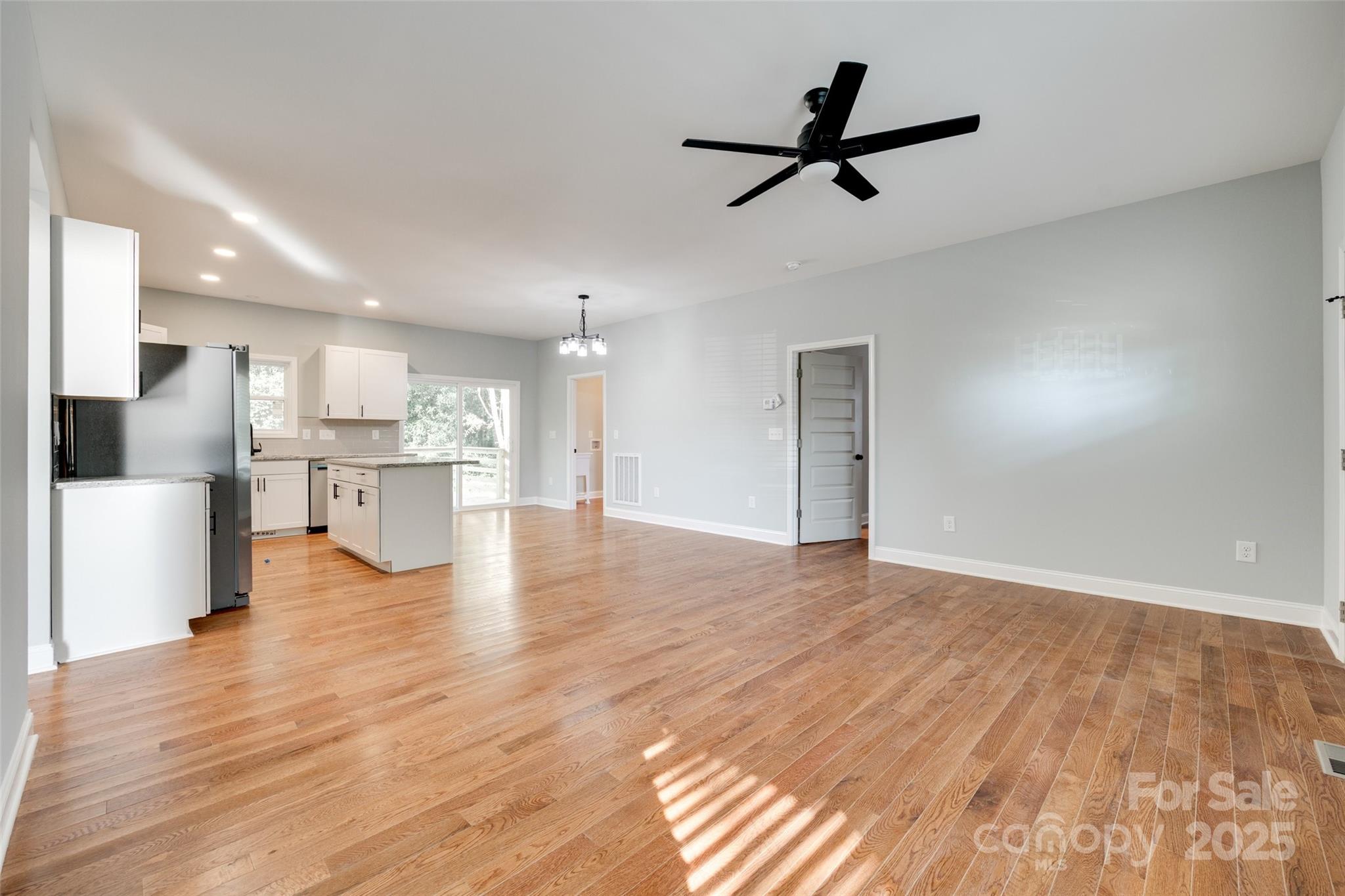 171 William Street York, SC 29745 - Photo 9 of 28 a view of a kitchen with a sink and wooden floor