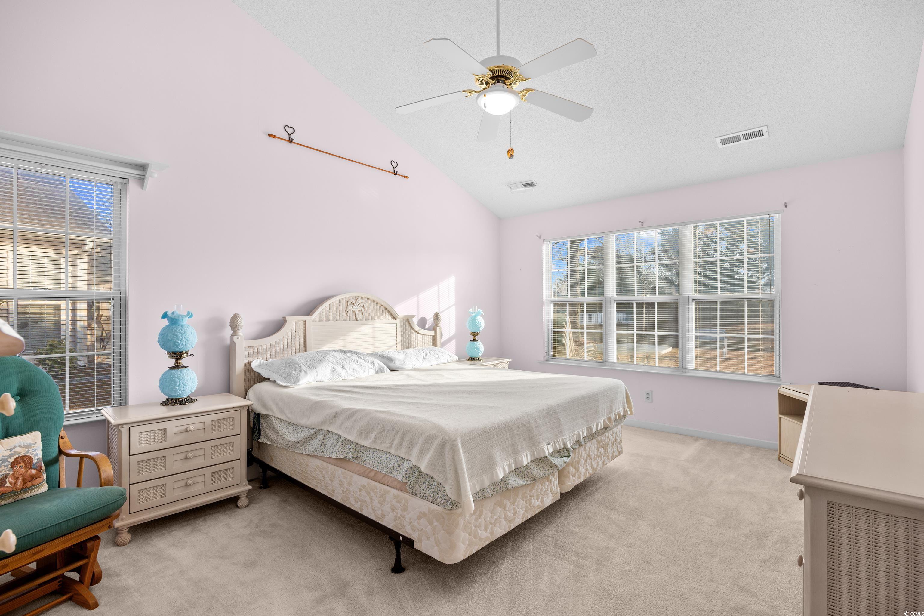 1744 Starbridge Drive Surfside Beach, SC 29575 - Photo 17 of 38 Carpeted bedroom featuring ceiling fan and high vaulted ceiling