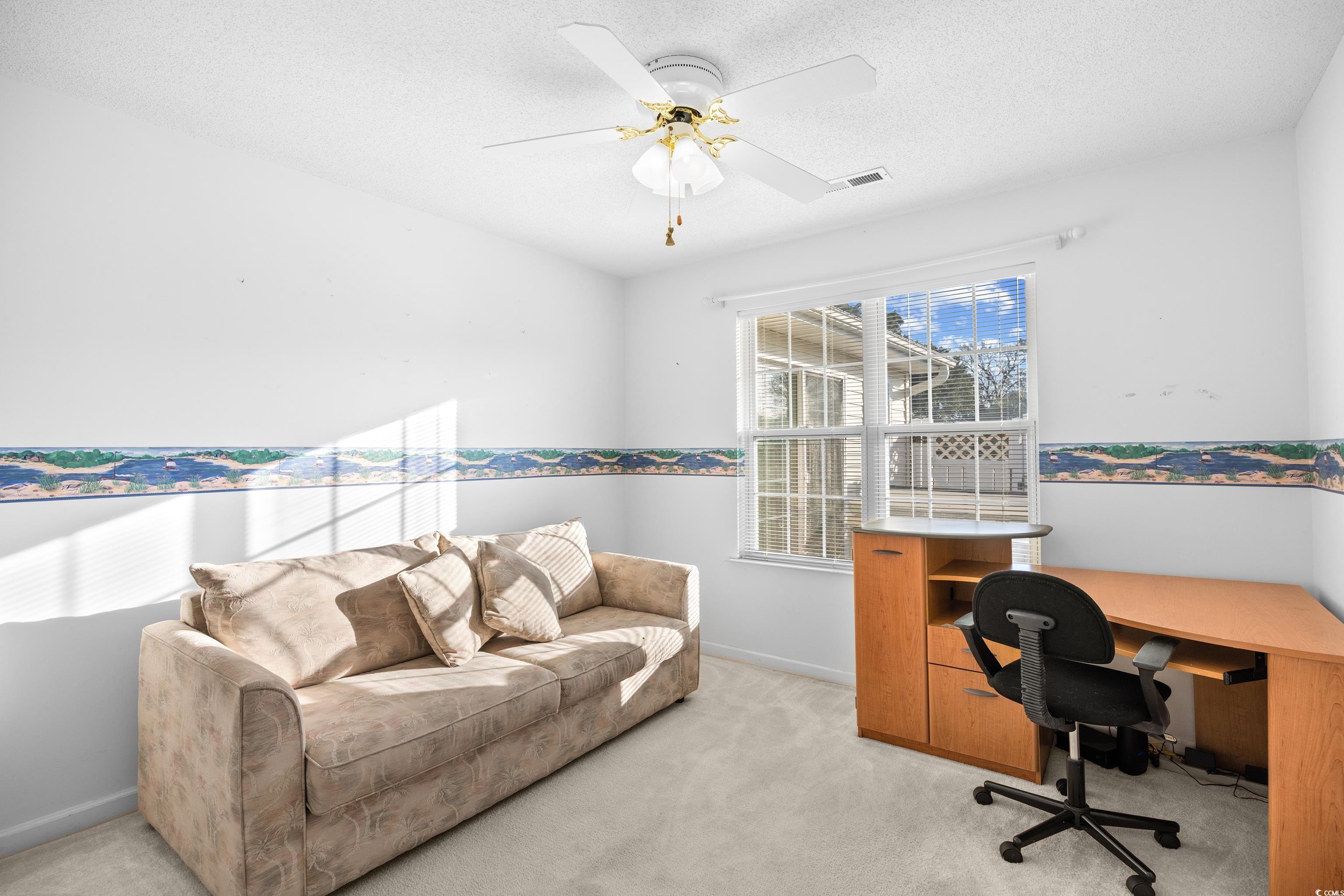 1744 Starbridge Drive Surfside Beach, SC 29575 - Photo 24 of 38 Office featuring light colored carpet, a textured ceiling, and ceiling fan