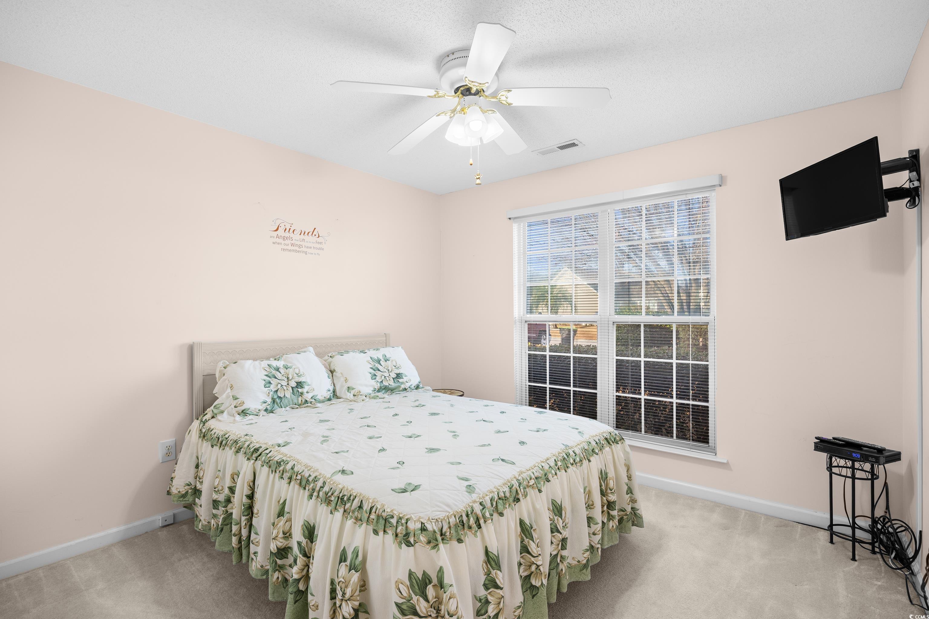 1744 Starbridge Drive Surfside Beach, SC 29575 - Photo 26 of 38 Bedroom featuring light carpet and a ceiling fan