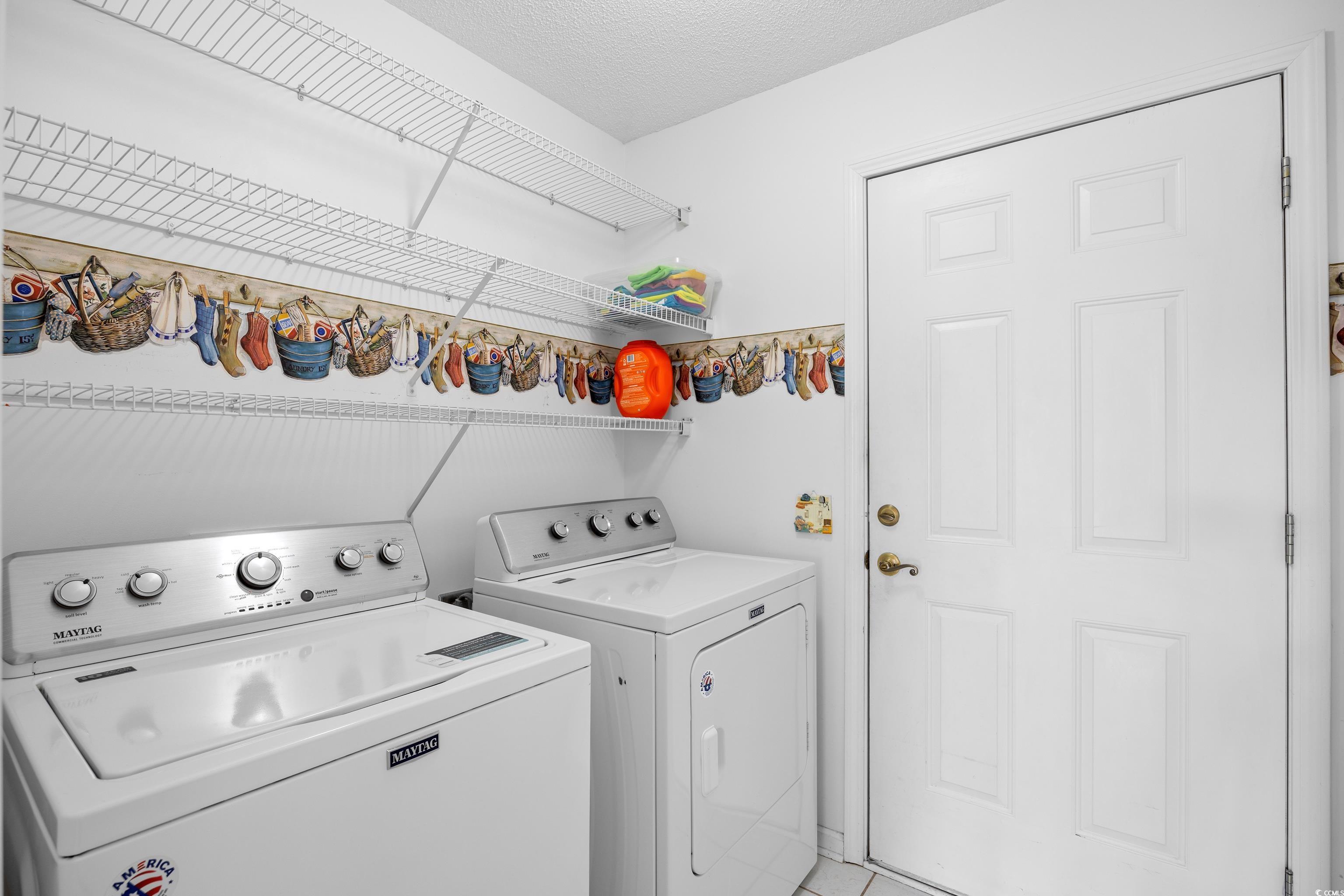 1744 Starbridge Drive Surfside Beach, SC 29575 - Photo 28 of 38 Washroom featuring separate washer and dryer and a textured ceiling