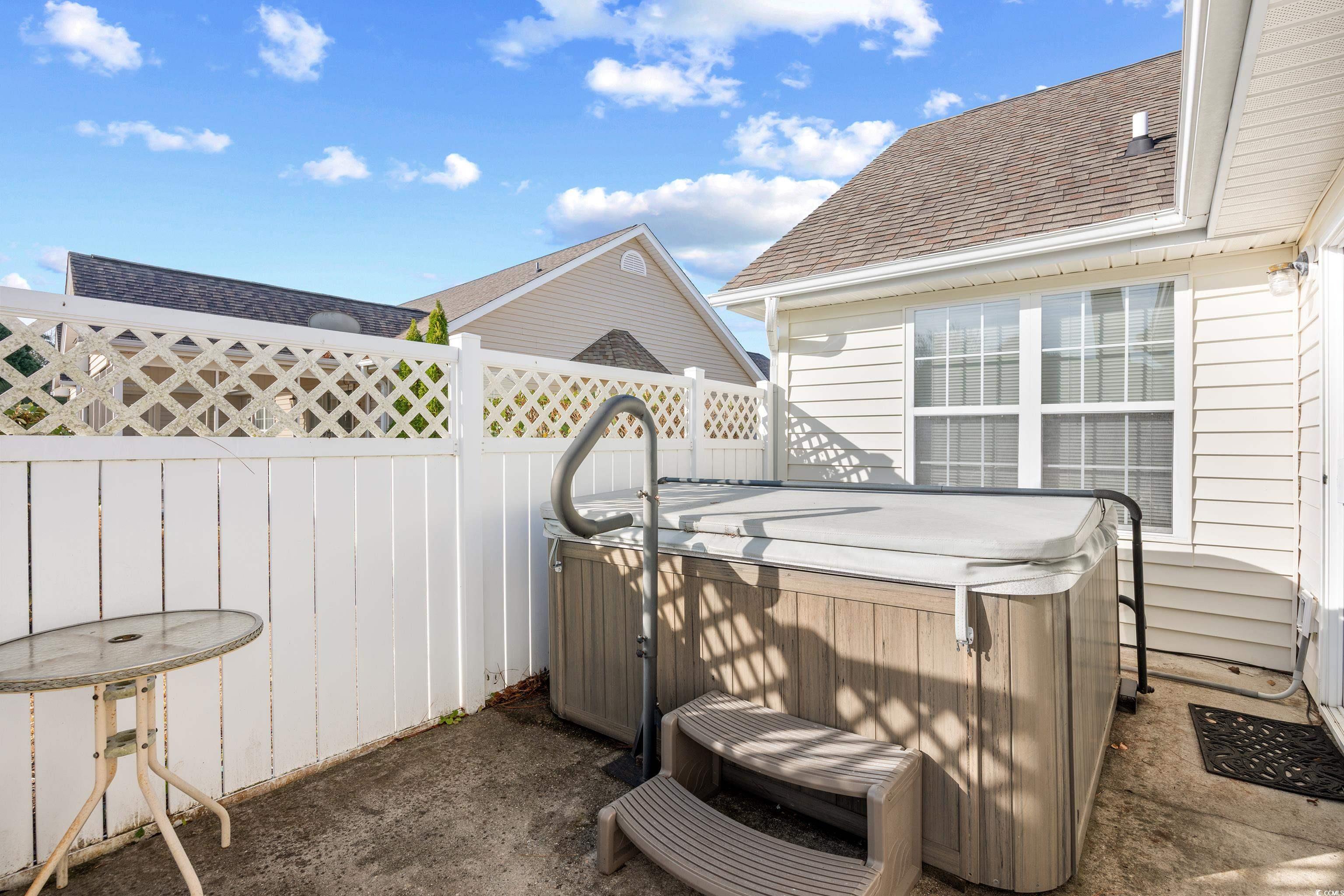 1744 Starbridge Drive Surfside Beach, SC 29575 - Photo 29 of 38 Fenced backyard with a hot tub