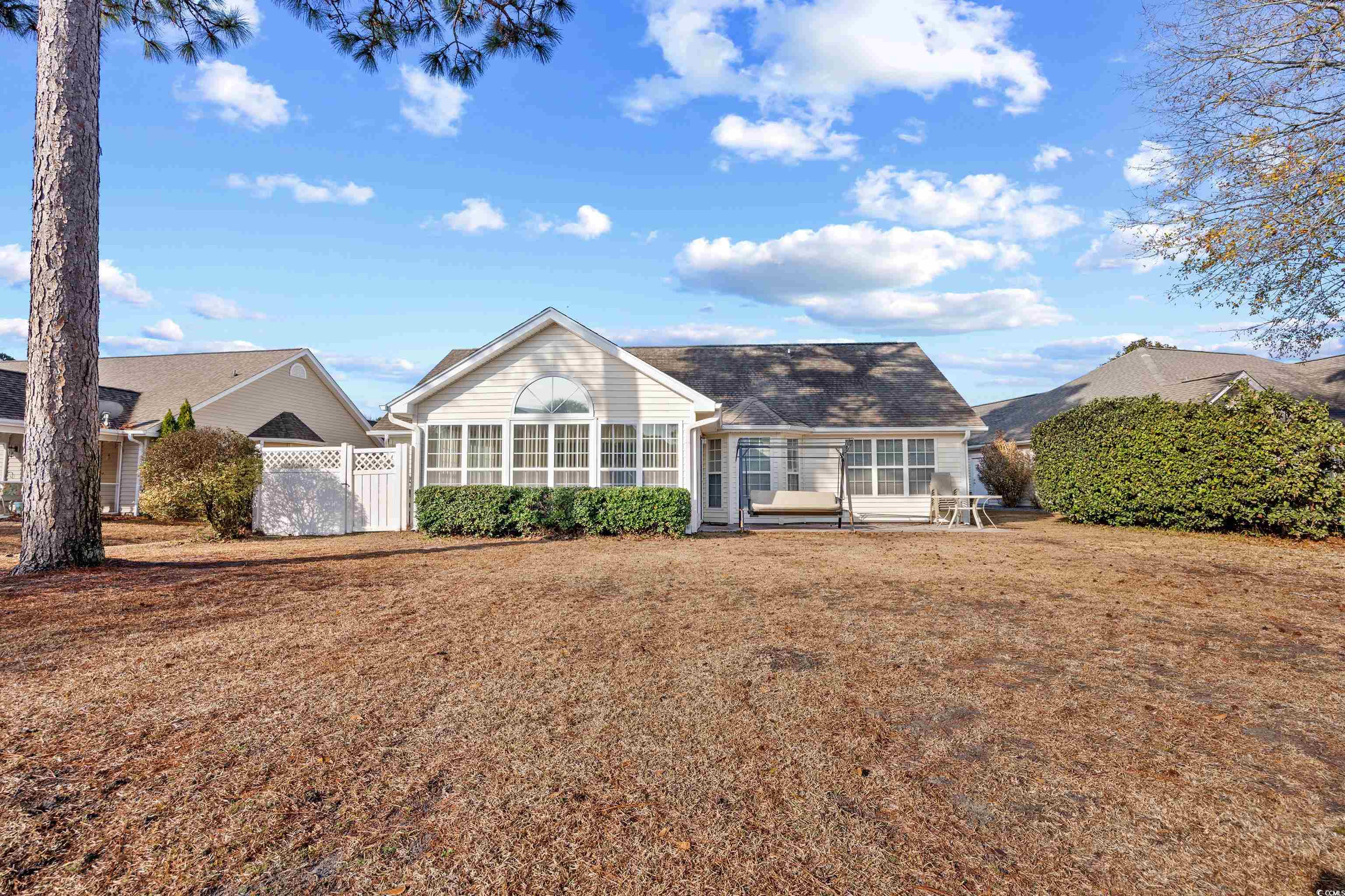 1744 Starbridge Drive Surfside Beach, SC 29575 - Photo 32 of 38 View of front of house featuring a patio and a gate
