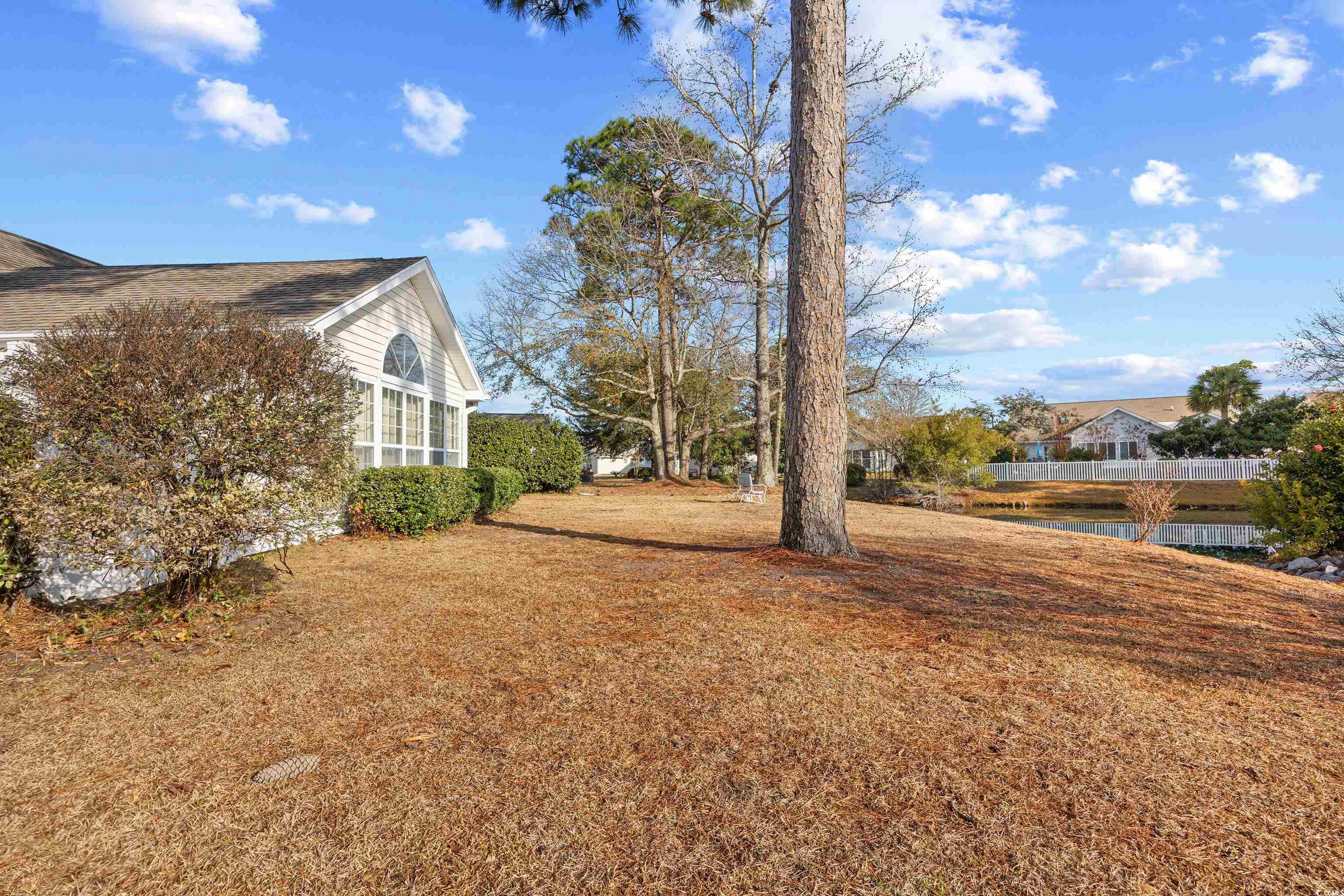 1744 Starbridge Drive Surfside Beach, SC 29575 - Photo 36 of 38 View of green lawn