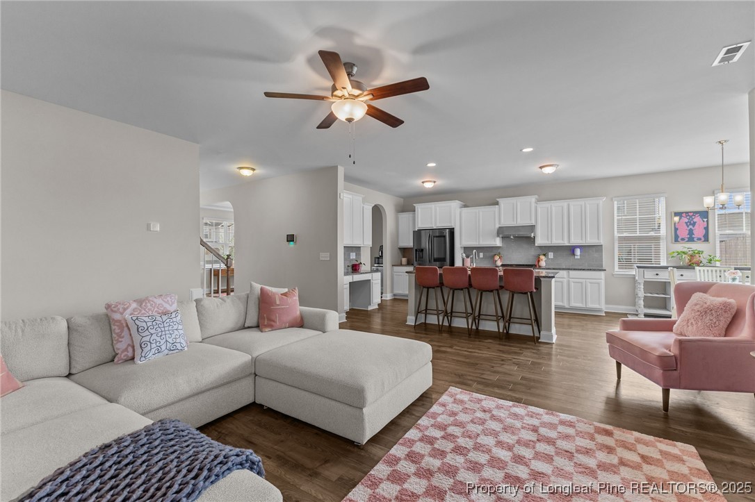 172 Haynes Church Road Raeford, NC 28376 - Photo 13 of 39 a living room with furniture and a wooden floor