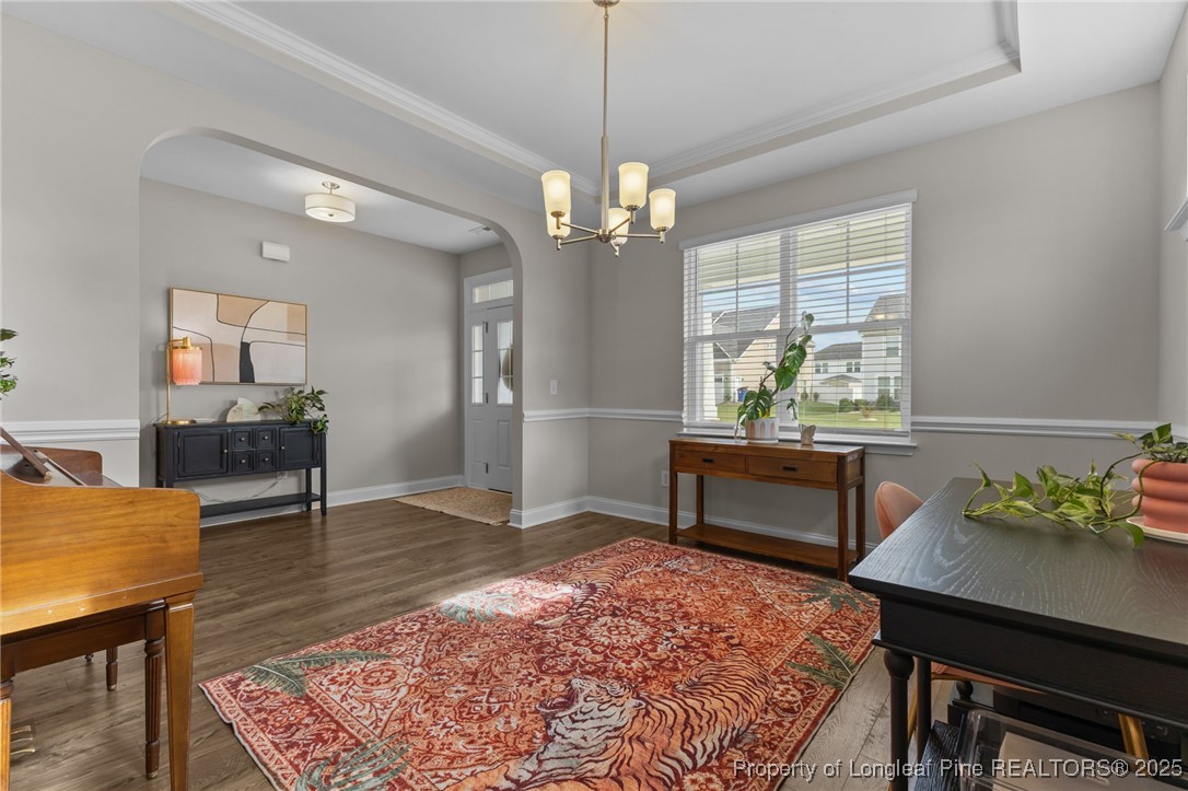 172 Haynes Church Road Raeford, NC 28376 - Photo 6 of 39 a workspace with furniture window and wooden floor