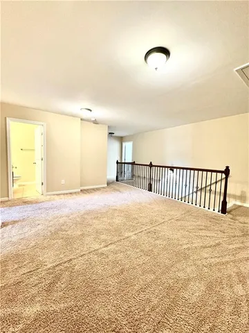 a view of a livingroom with wooden floor