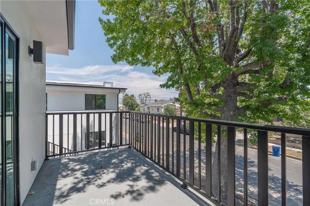 7435 Ranchito Avenue Van Nuys, CA 91405 - Photo 16 of 16 a view of a balcony with a pot