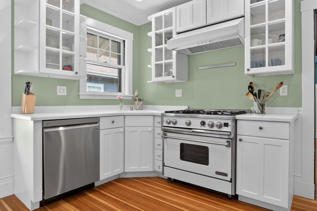 15 Kingsboro Park, Unit 2 Boston, MA 02130 - Photo 13 of 30 a kitchen with stainless steel appliances a stove a sink and a microwave