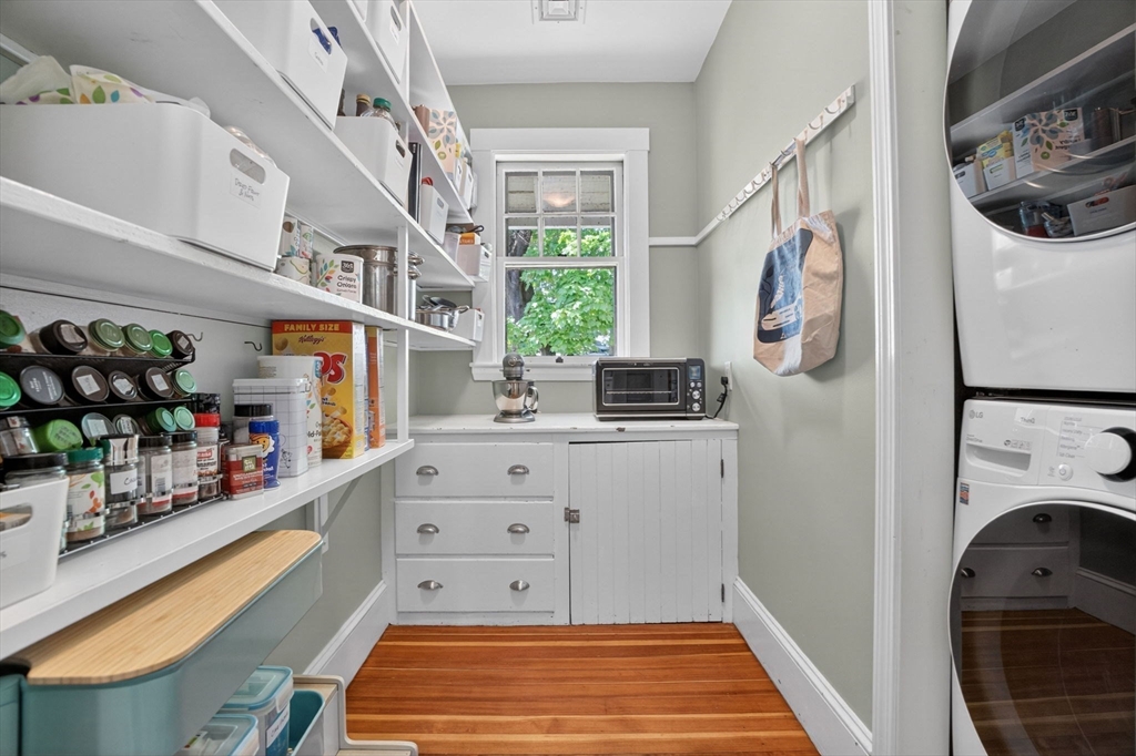 15 Kingsboro Park, Unit 2 Boston, MA 02130 - Photo 14 of 30 a room with lots of white furniture a washer and dryer