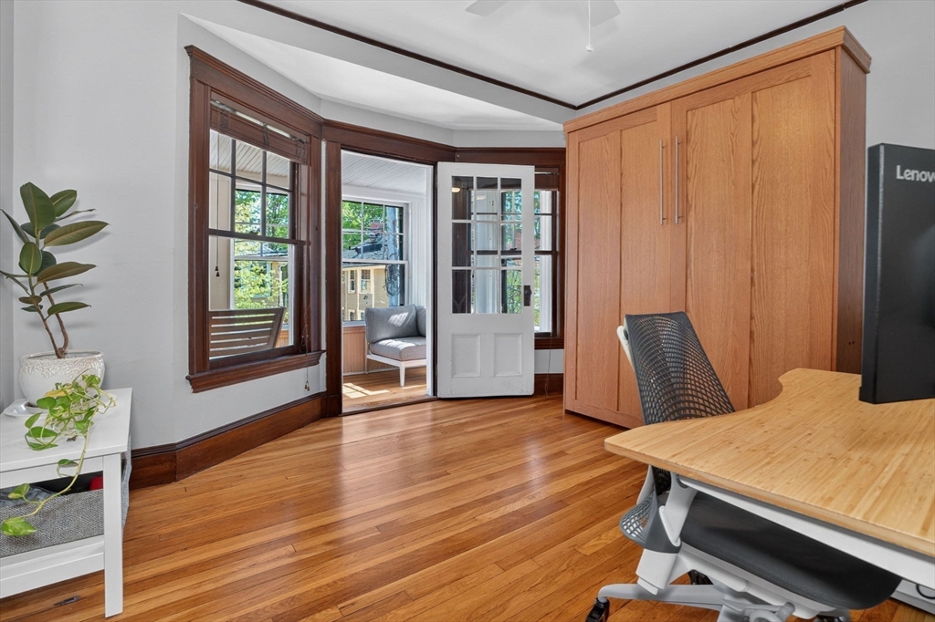 15 Kingsboro Park, Unit 2 Boston, MA 02130 - Photo 16 of 30 a room with wooden floor and furniture