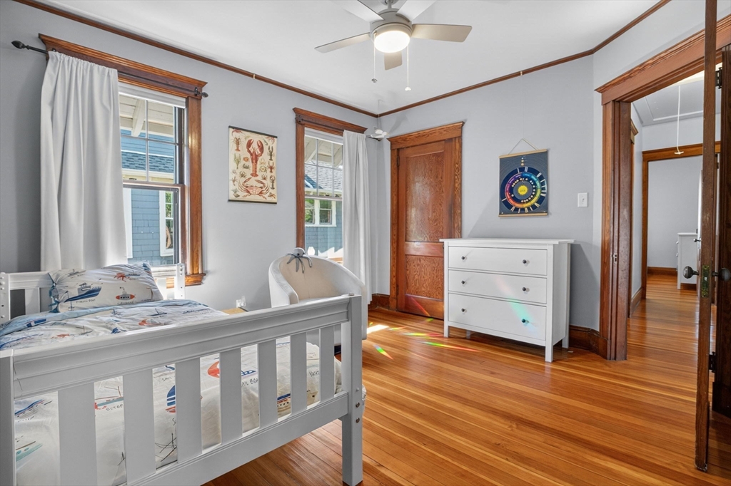 15 Kingsboro Park, Unit 2 Boston, MA 02130 - Photo 17 of 30 a bedroom with furniture and wooden floor