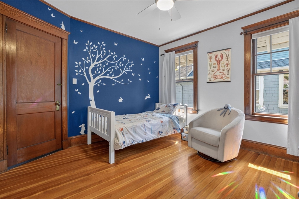 15 Kingsboro Park, Unit 2 Boston, MA 02130 - Photo 18 of 30 a bedroom with a bed couch and a window