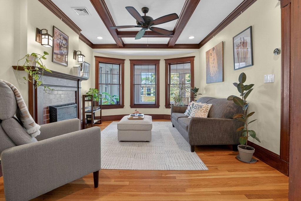 15 Kingsboro Park, Unit 2 Boston, MA 02130 - Photo 5 of 30 a living room with fireplace furniture and a large window