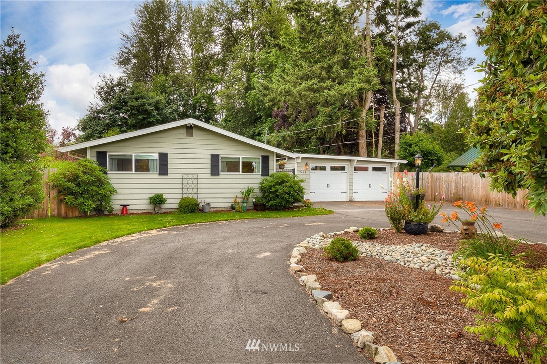 7484 Riverside Drive East Sumner, WA 98390 - Photo 1 of 23 a view of a house with a yard