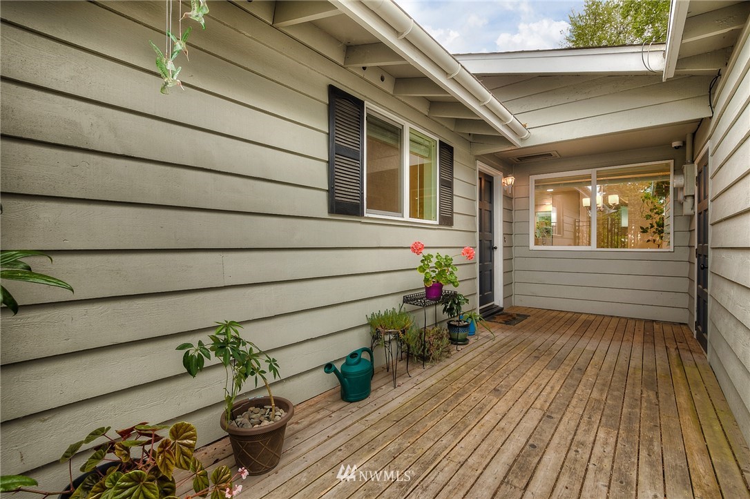 7484 Riverside Drive East Sumner, WA 98390 - Photo 3 of 23 a view of a porch with wooden floor