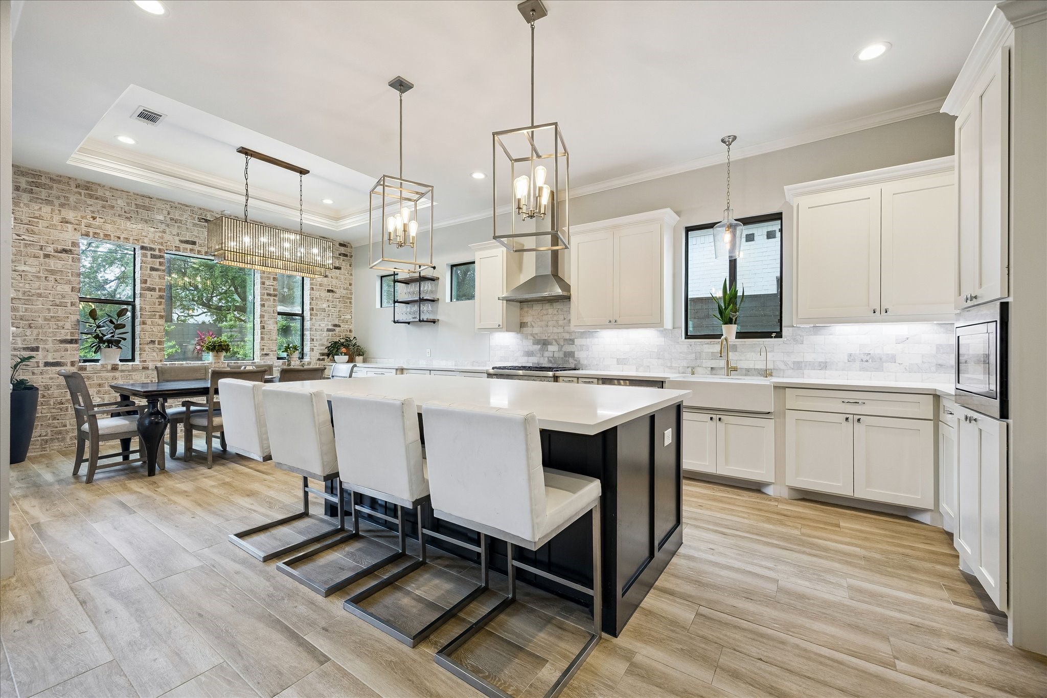 1519 Richelieu Lane Houston, TX 77018 - Photo 7 of 30 Kitchen features an island with pendant lighting and seating