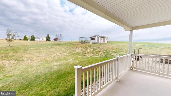 a bathroom with a bathtub and a window
