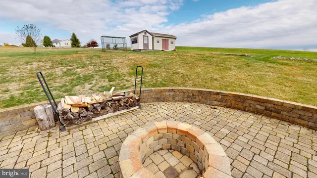 a bathroom with a granite countertop shower and a sink