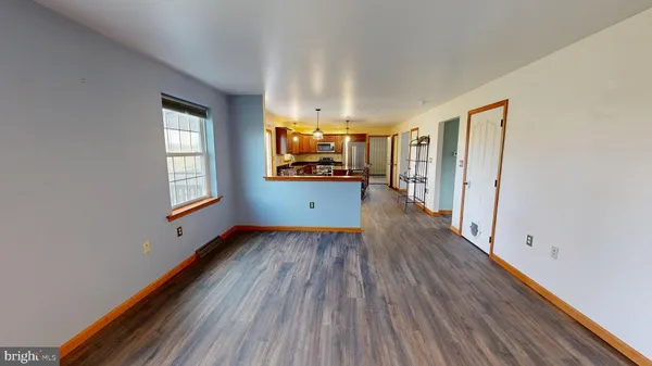 a view of livingroom with furniture and wooden floor