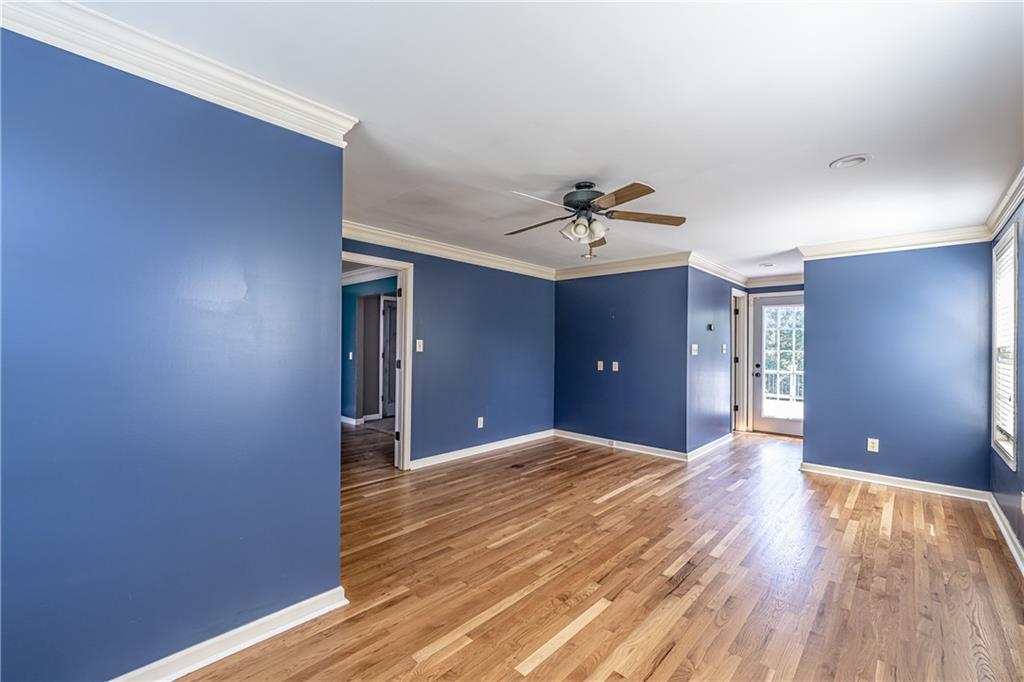 113 Warwick Way Rome, GA 30161 - Photo 27 of 49 a view of a livingroom with a ceiling fan window and hardwood floor