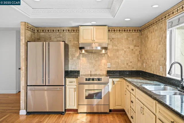 a bedroom with a bed and a potted plant