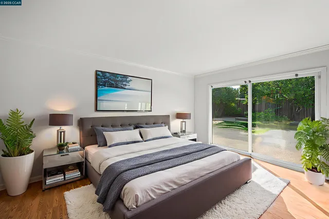 a view of a house with backyard sitting area and porch