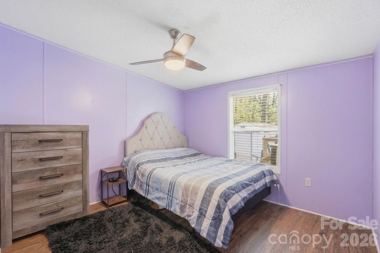 605 Ridgewood Court Mount Holly, NC 28120 - Photo 17 of 32 a bedroom with a bed and a dresser