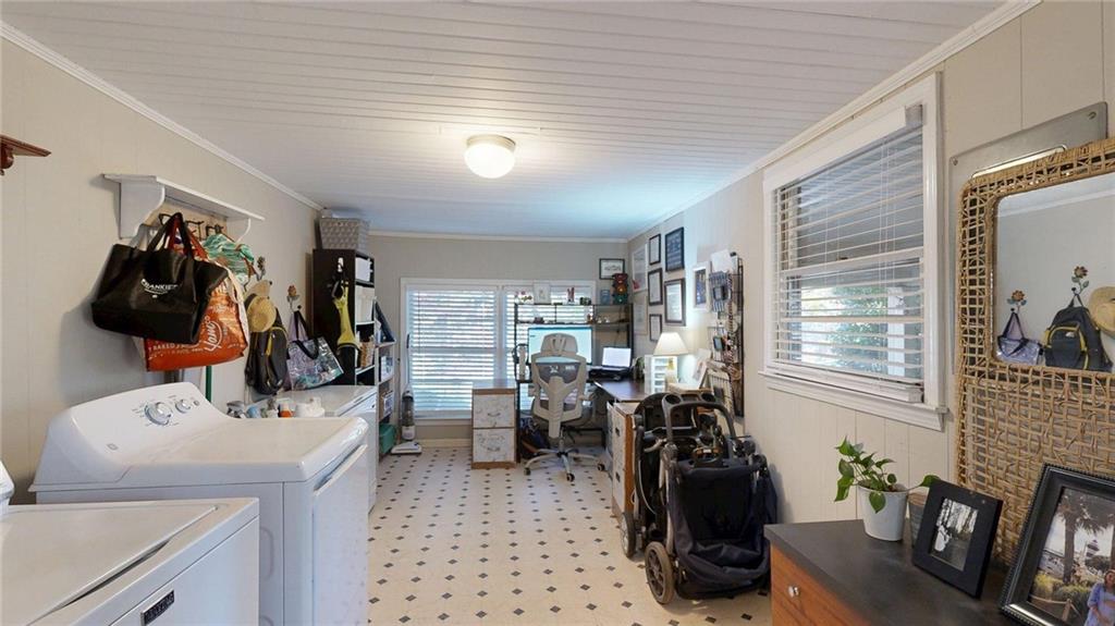 1838 Bruce Road Northeast Atlanta, GA 30329 - Photo 25 of 59 a room with furniture and wooden floor