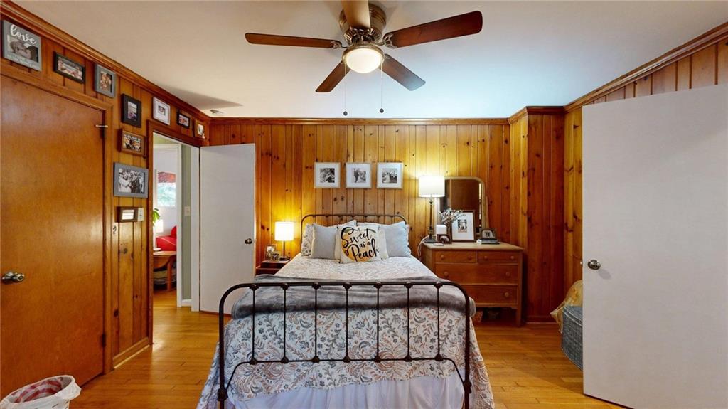 1838 Bruce Road Northeast Atlanta, GA 30329 - Photo 30 of 59 a bedroom with a bed window and a table