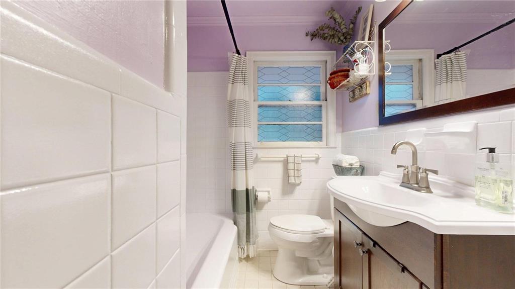 1838 Bruce Road Northeast Atlanta, GA 30329 - Photo 32 of 59 a bathroom with a sink toilet and shower