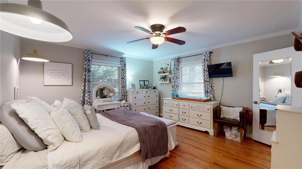 1838 Bruce Road Northeast Atlanta, GA 30329 - Photo 34 of 59 a bedroom with a bed and a dresser