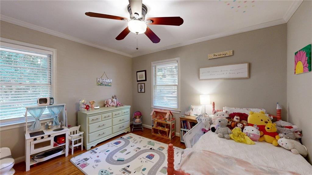 1838 Bruce Road Northeast Atlanta, GA 30329 - Photo 42 of 59 a bed room with a bed and a window