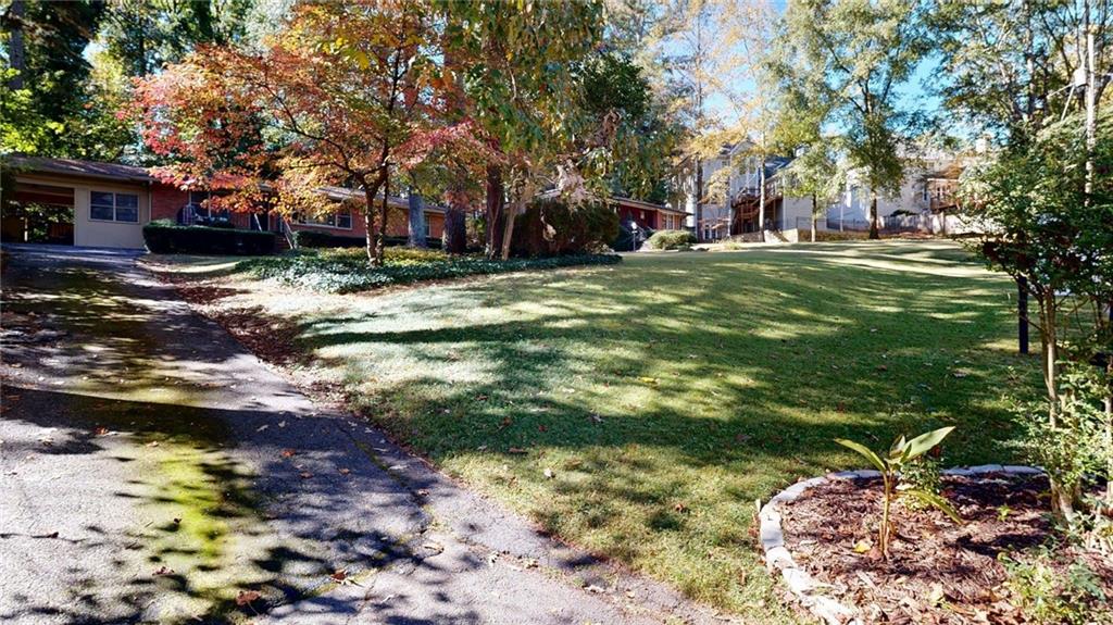 1838 Bruce Road Northeast Atlanta, GA 30329 - Photo 48 of 59 a view of a park with large trees