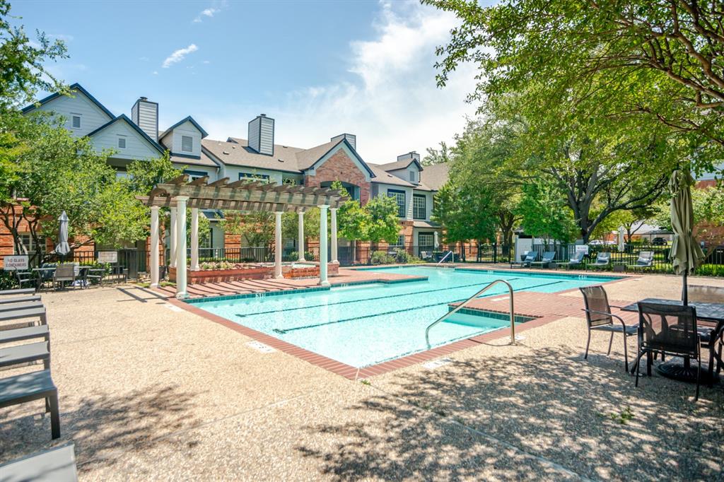 2524 Preston Road, Unit 808 Plano, TX 75093 - Photo 28 of 31 Resort-style swimming pool featuring a pergola, brick coping, concrete decking, and perimeter fencing