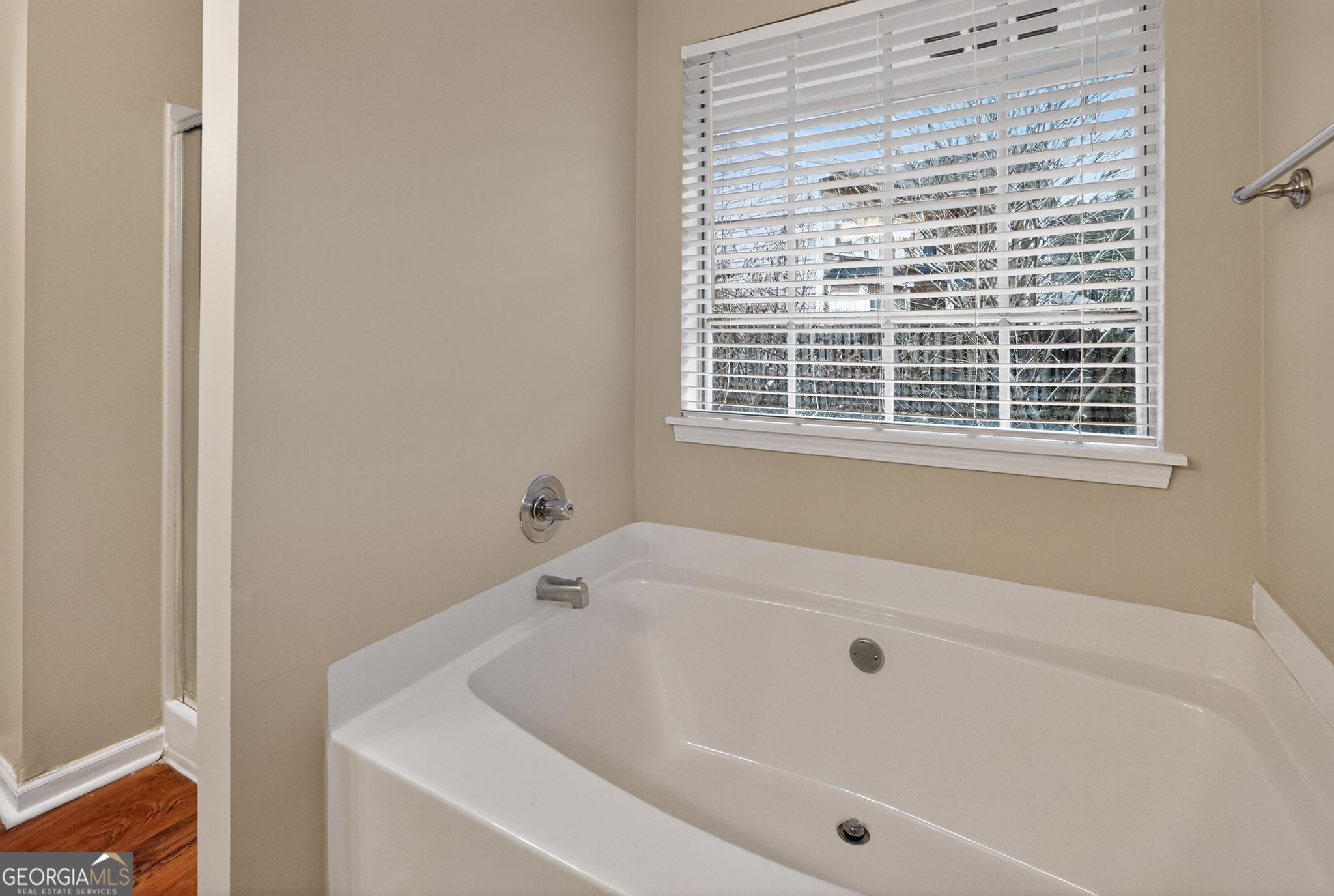 205 Whirlwind Court Atlanta, GA 30349 - Photo 26 of 32 a bathroom with bathtub