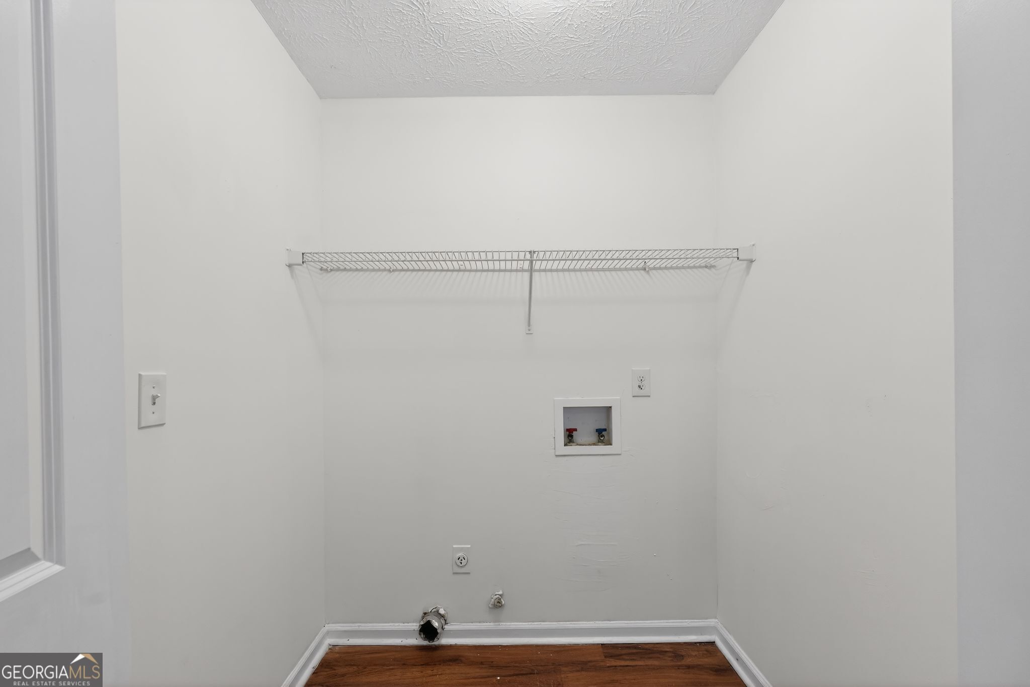 205 Whirlwind Court Atlanta, GA 30349 - Photo 28 of 32 a bathroom with a small window