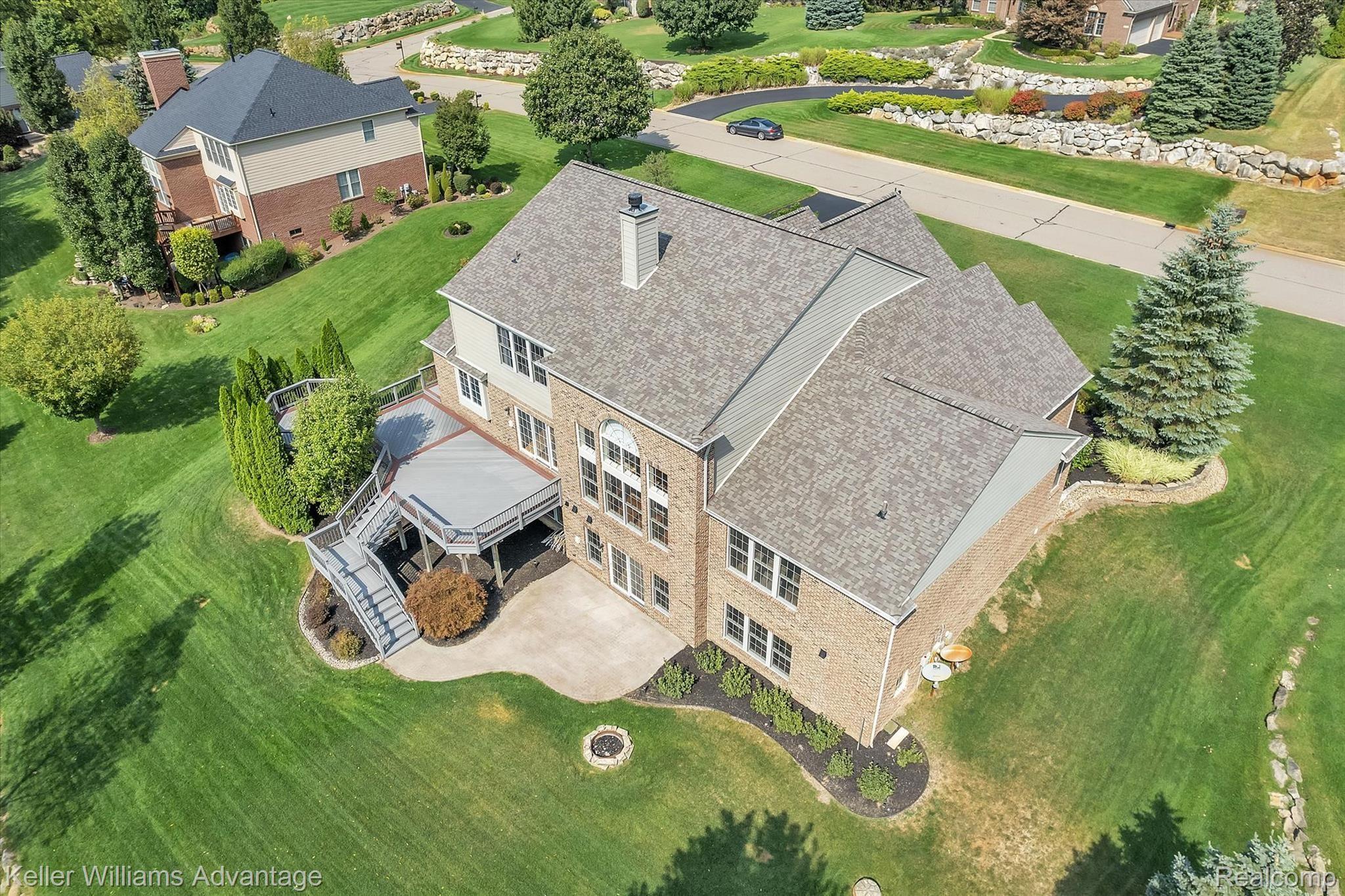 9042 Ridgefield Drive Brighton, MI 48114 - Photo 53 of 61 Stately presence with many windows that flow with sunlight