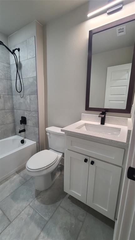 2142 Edd Road Dallas, TX 75253 - Photo 8 of 14 a bathroom with a granite countertop sink toilet and shower