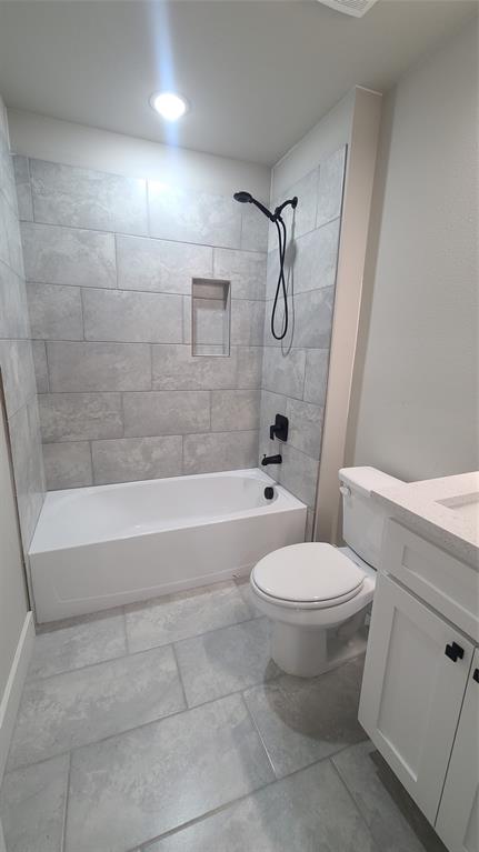 2142 Edd Road Dallas, TX 75253 - Photo 9 of 14 a bathroom with a toilet and a shower