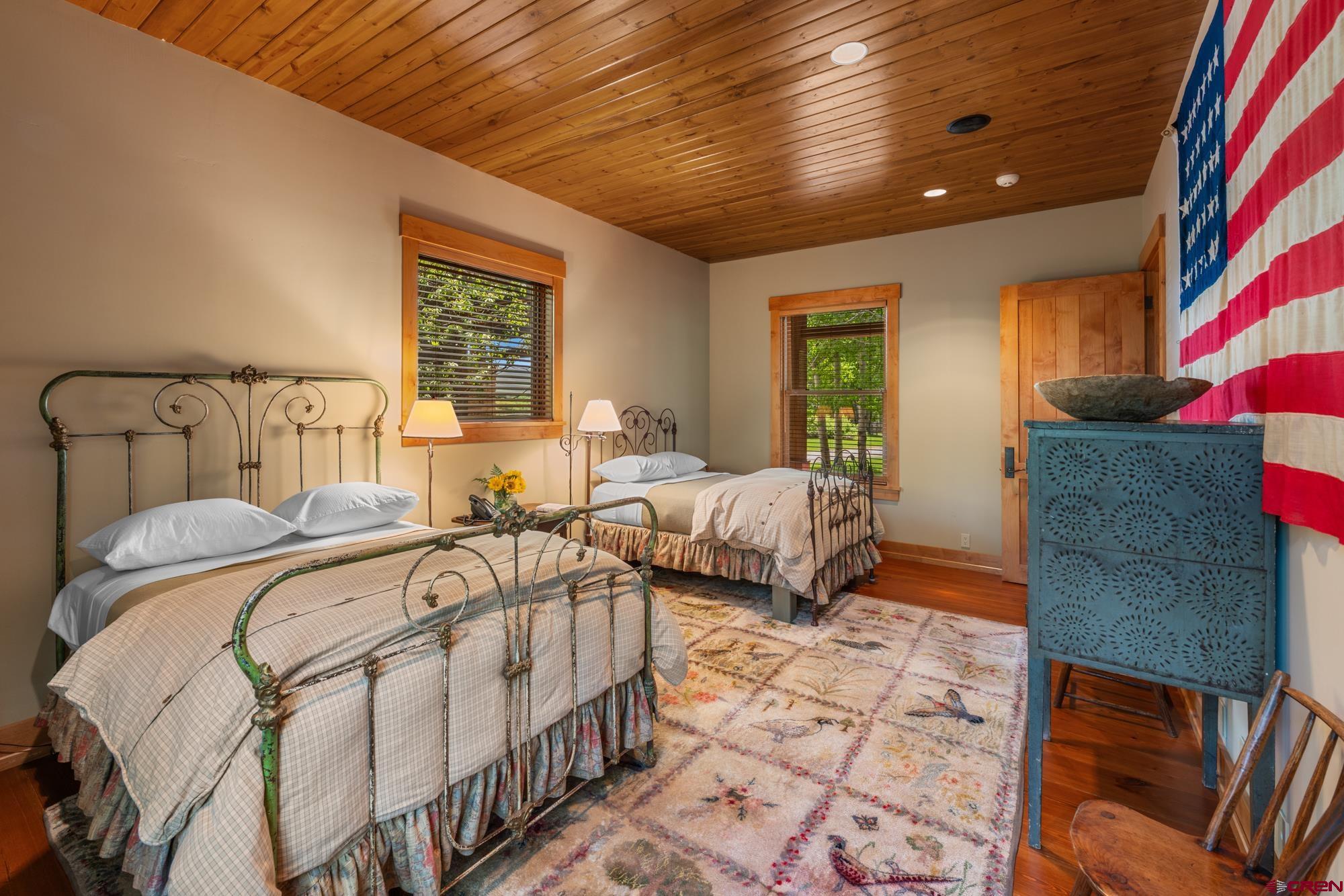 505 Eagle Creek Road Gunnison, CO 81230 - Photo 31 of 45 a bedroom with double bed and a window