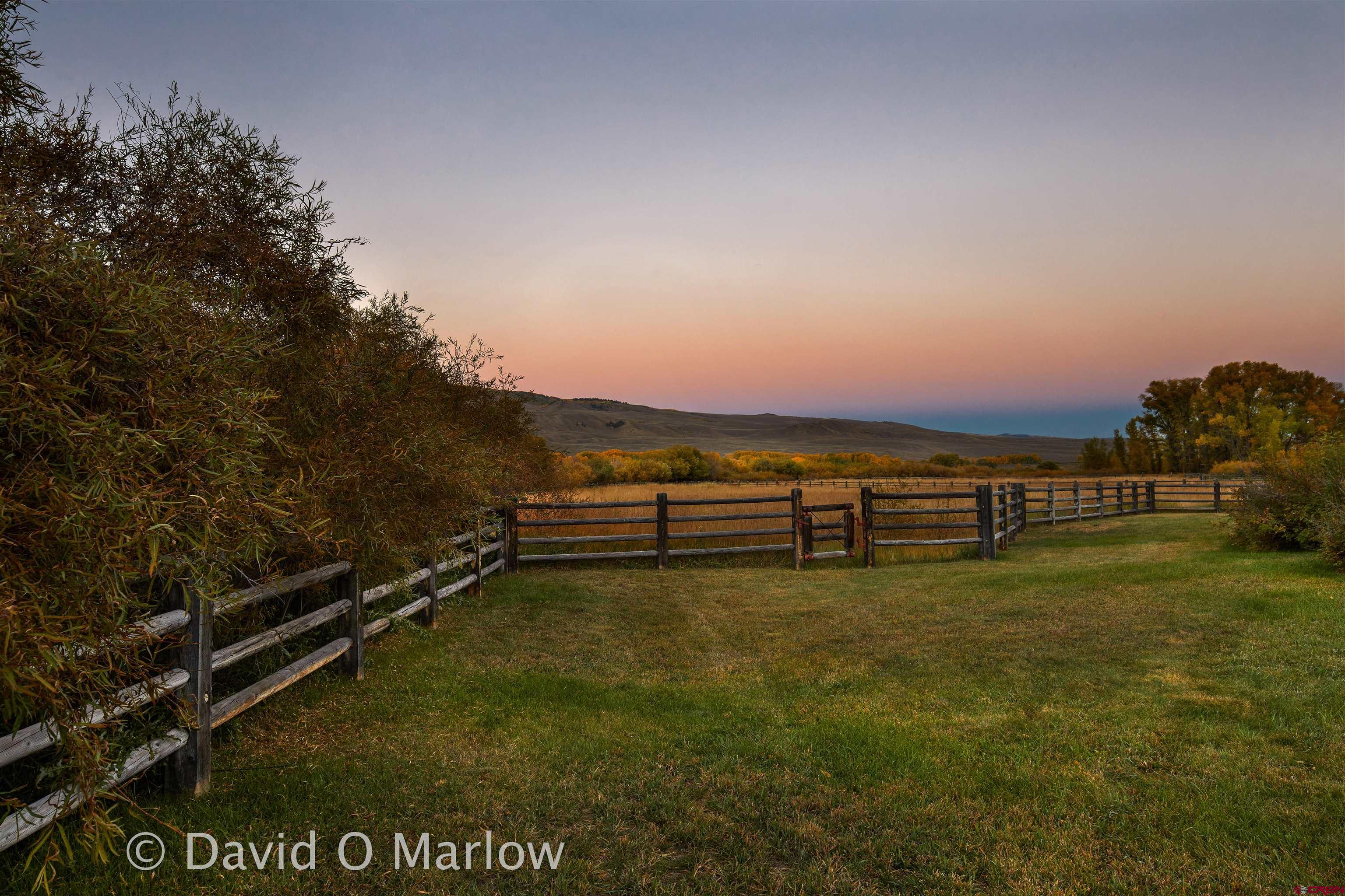 505 Eagle Creek Road Gunnison, CO 81230 - Photo 40 of 45 a view of a field with wooden fence