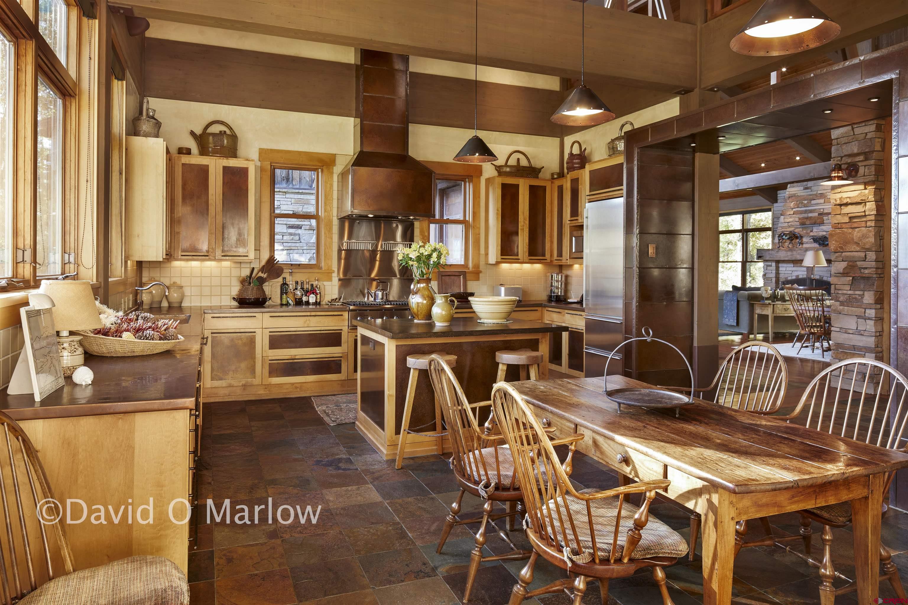 505 Eagle Creek Road Gunnison, CO 81230 - Photo 9 of 45 a dinning area with pool table and chairs