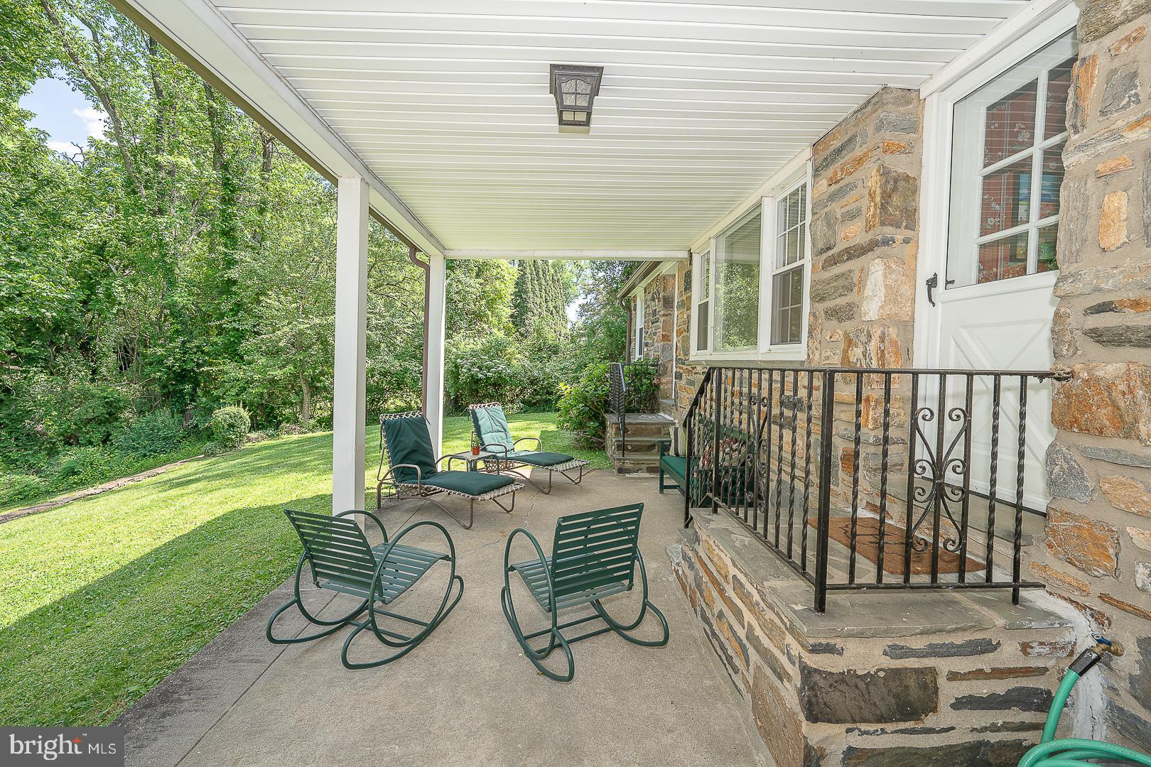 1125 Hillcrest Road Penn Valley, PA 19072 - Photo 27 of 38 Rear Patio with access from the kitchen and den